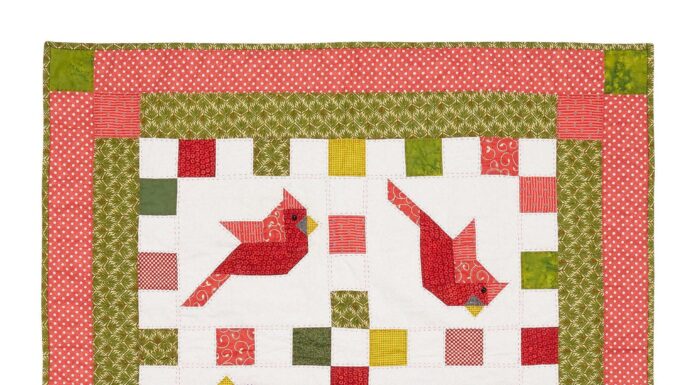 Crafting Cheer with the Cardinal Quilt: A Cozy Winter Delight