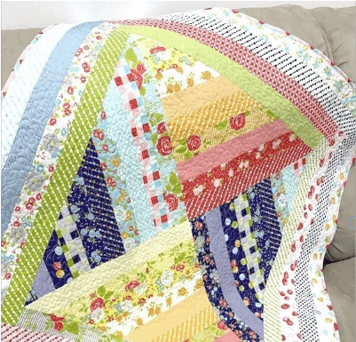 Embrace Happiness with the Cozy Patchwork Delight Quilt
